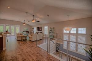 a living room with a couch and a table at 4BD 3BR Pool Paradise 1 mile from Beach & Downtown in Saint Augustine