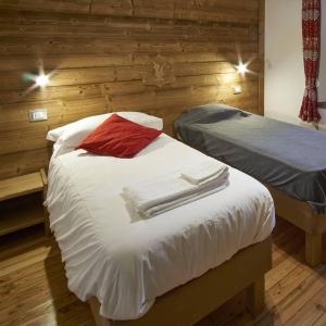Voodi või voodid majutusasutuse Chalet du Paradis toas