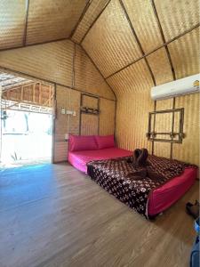 Postel nebo postele na pokoji v ubytování Modtanoi Paradise Homestay