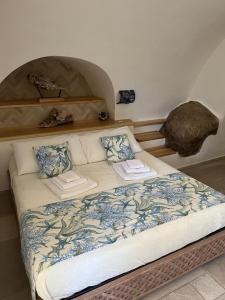 เตียงในห้องที่ Stanza privata con giardino