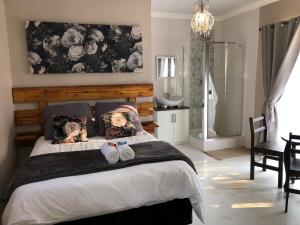 Ένα ή περισσότερα κρεβάτια σε δωμάτιο στο Home@Harts