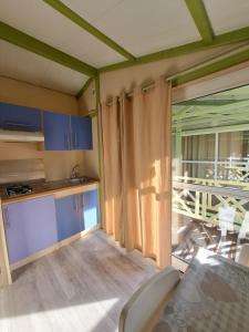 A bed or beds in a room at Camping Dal Pino