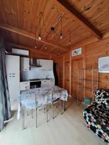 A kitchen or kitchenette at Camping Dal Pino