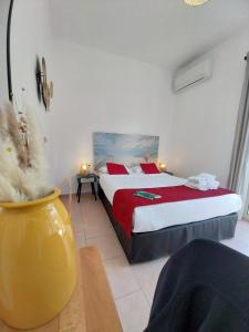 Postel nebo postele na pokoji v ubytování Hôtel Padolo