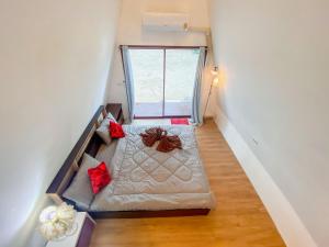 Postel nebo postele na pokoji v ubytování Modtanoi Paradise Homestay