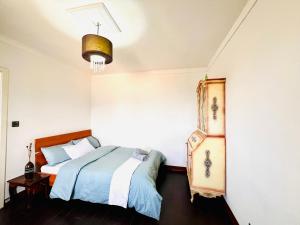 Postel nebo postele na pokoji v ubytování R2 Salina Seaview Retreat