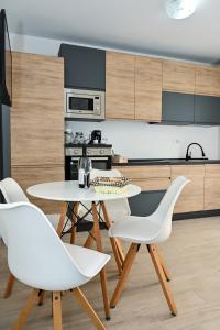 Kuchyň nebo kuchyňský kout v ubytování Porto Azzurro apartments