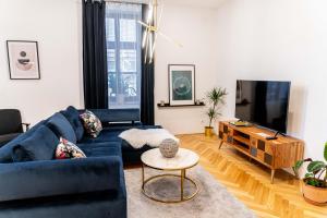 TV a/nebo společenská místnost v ubytování Apartmány Marienhof
