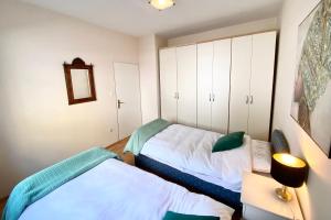 Posteľ alebo postele v izbe v ubytovaní Apartment Nera Zadar