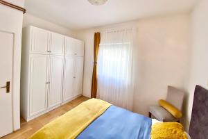 Posteľ alebo postele v izbe v ubytovaní Apartment Nera Zadar