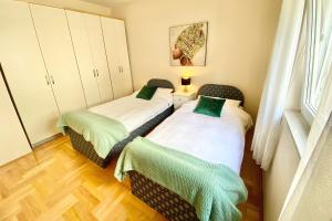 Posteľ alebo postele v izbe v ubytovaní Apartment Nera Zadar