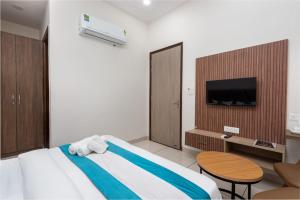 TV a/nebo společenská místnost v ubytování The Setu Hotel & Resorts + 37 fotografií