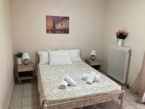 Postel nebo postele na pokoji v ubytování Διαμέρισμα στην Κέρκυρα