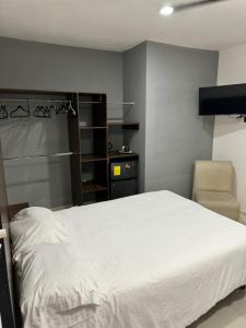 Postel nebo postele na pokoji v ubytování Apartamentos 31