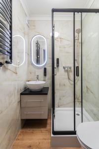 Ένα μπάνιο στο Apartament Capri z widokiem na morze- Krynica Morska