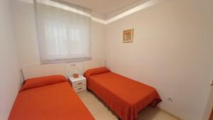 Postel nebo postele na pokoji v ubytování Apartamento la Brisa del Mar