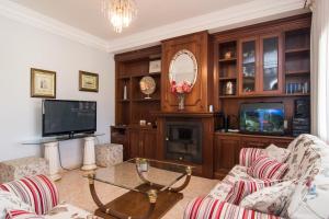 TV a/nebo společenská místnost v ubytování Villa Darder , Sa garriga