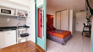 A cozinha ou cozinha compacta de Sweet Crépuscule - Studio avec Vue Mer Imprenable & Piscine