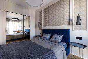 Krevet ili kreveti u jedinici u objektu Golden Apartments Wroclaw&JP19