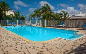 A piscina localizada em Sweet Crépuscule - Studio avec Vue Mer Imprenable & Piscine ou nos arredores