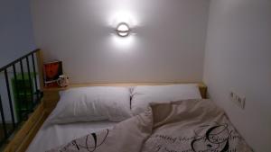 Posteľ alebo postele v izbe v ubytovaní Apartment Studio Prima