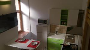 Kuchyňa alebo kuchynka v ubytovaní Apartment Studio Prima