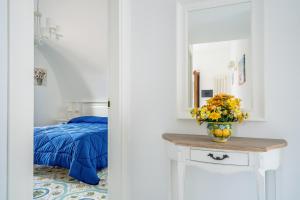 Postel nebo postele na pokoji v ubytování Villa Prota
