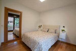 Ένα ή περισσότερα κρεβάτια σε δωμάτιο στο Apartamento Haitz