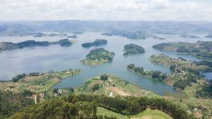 an aerial view of several islands in a lake at Lake bunyonyi view lodge in Kabale