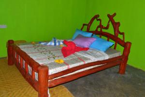 Llit o llits en una habitació de Lake bunyonyi view lodge