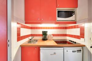 Кухня или мини-кухня в Résidence Plagne Lauze - maeva Home - Studio 4 personnes - Sélection 00
