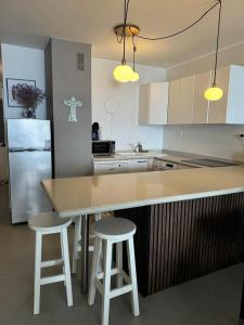 Kuchnia lub aneks kuchenny w obiekcie Elegante apartamento con vista directa al mar