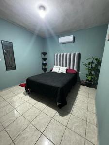 Acogedor depa cerca del Tec tesisinde bir odada yatak veya yataklar