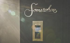 a sign that says remember with a parking meter at Somewhere - Estoril Guesthouse in Estoril