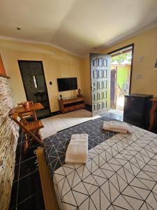 Postel nebo postele na pokoji v ubytování Suíte Verao