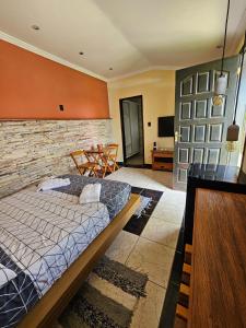 TV a/nebo společenská místnost v ubytování Suíte Verao