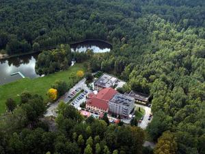 an aerial view of a building in the middle of a forest at Trojak in Mysłowice