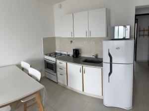 Køkken eller tekøkken på Apartments Trelew