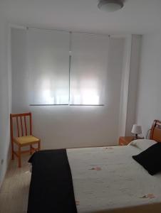 Łóżko lub łóżka w pokoju w obiekcie Apartamento de 2 dormitorios en Magic World, Marina D'or