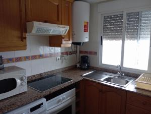 Kuchnia lub aneks kuchenny w obiekcie Apartamento de 2 dormitorios en Magic World, Marina D'or