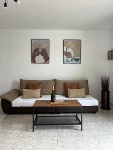 a living room with a couch and a table at Garana in Playa Blanca