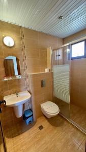 Ένα μπάνιο στο Guest House Primorsko - Uzundzha