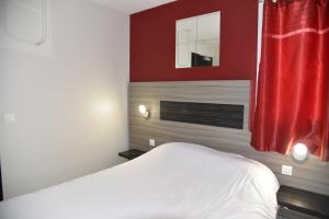 Postel nebo postele na pokoji v ubytování Hotel du Triangle