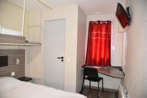 Postel nebo postele na pokoji v ubytování Hotel du Triangle
