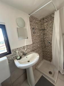 Een badkamer bij Ciuri Ciuri Apartments