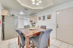 a kitchen with a dining room table and chairs at Pet-Friendly San Juan Home with Private Yard and Grill in San Juan