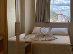 Postel nebo postele na pokoji v ubytování Hotel Zanon