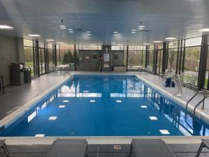 a large swimming pool in a large building at Comfort Inn Largo-Washington DC East in Upper Marlboro