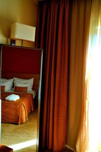 Cama ou camas em um quarto em Hotel Lusitania Congress & Spa