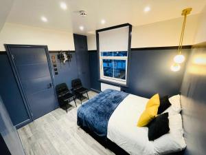 a bedroom with a king sized bed and a window at Luxury Room, Central London, Ideal for Tourists in London